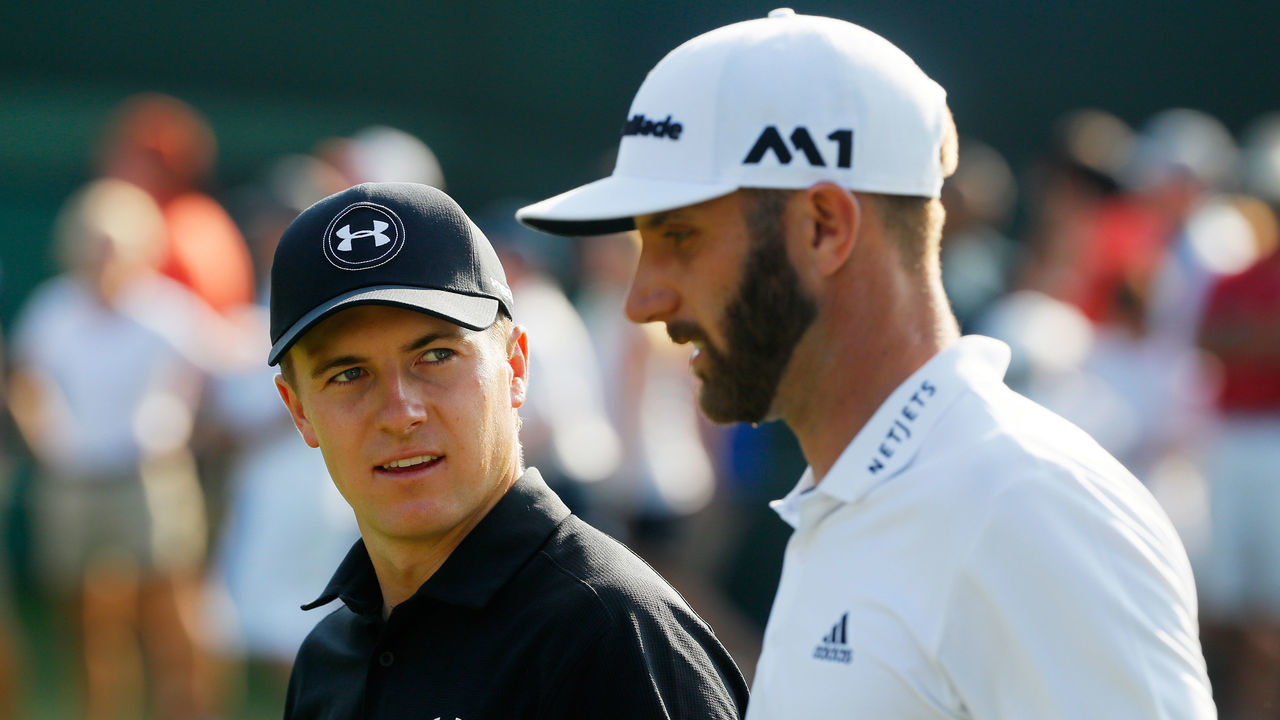 ATLANTA, GA - SEPTEMBER 23: Jordan Spieth of the United States and Dustin Johnson of the United States walk on the 18th hole during the third round of the TOUR Championship at East Lake Golf Club on September 23, 2017 in Atlanta, Georgia.
