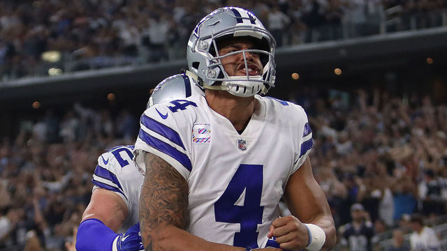 ARLINGTON, TX - OCTOBER 08: Dak Prescott #4 celebrates his touchdown run with Jason Witten #82 of the Dallas Cowboys in the fourth quarter against the Green Bay Packers at AT&T Stadium on October 8, 2017 in Arlington, Texas.