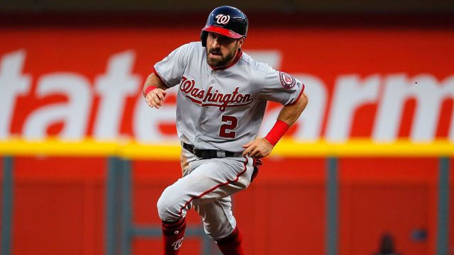 ATLANTA, GA - APRIL 03: Adam Eaton #2 of the Washington Nationals advances to third base on a single hit by Anthony Rendon #6 in the first inning against the Atlanta Braves at SunTrust Park on April 3, 2018 in Atlanta, Georgia.