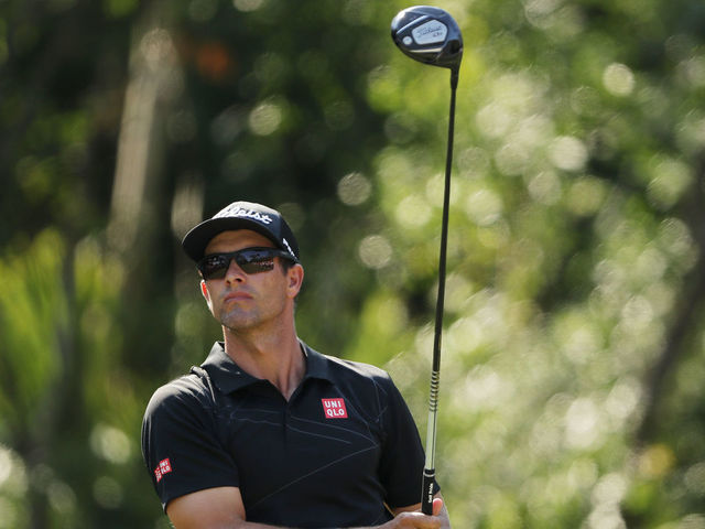 PONTE VEDRA BEACH, FL - MAY 10: Adam Scott of Australia plays his shot from the 15th tee during the first round of THE PLAYERS Championship on the Stadium Course at TPC Sawgrass on May 10, 2018 in Ponte Vedra Beach, Florida.
