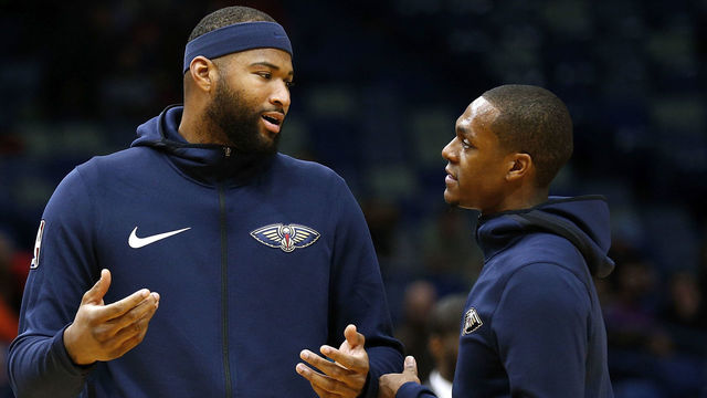 NEW ORLEANS, LA - DECEMBER 06: DeMarcus Cousins #0 of the New Orleans Pelicans talks to Rajon Rondo #9 before a game against the Denver Nuggets at the Smoothie King Center on December 6, 2017 in New Orleans, Louisiana.