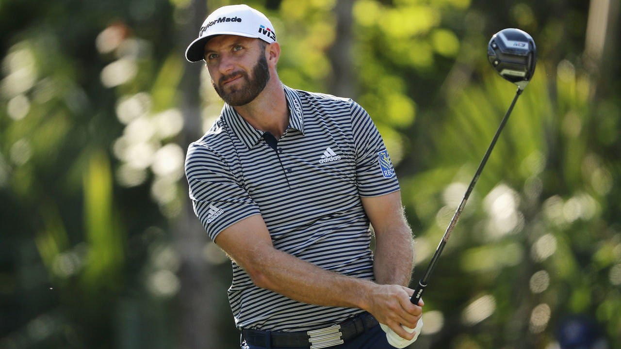 PONTE VEDRA BEACH, FL - MAY 10: Dustin Johnson of the United States plays his shot from the 15th tee during the first round of THE PLAYERS Championship on the Stadium Course at TPC Sawgrass on May 10, 2018 in Ponte Vedra Beach, Florida.