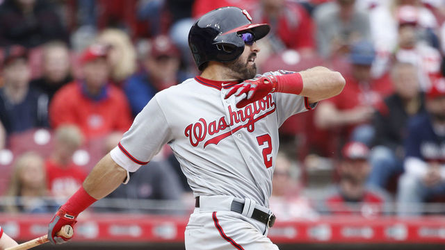 CINCINNATI, OH - MARCH 31: Adam Eaton #2 of the Washington Nationals hits a single to drive in two runs in the eighth inning of the game against the Cincinnati Reds at Great American Ball Park on March 31, 2018 in Cincinnati, Ohio. The Nationals won 13-7.