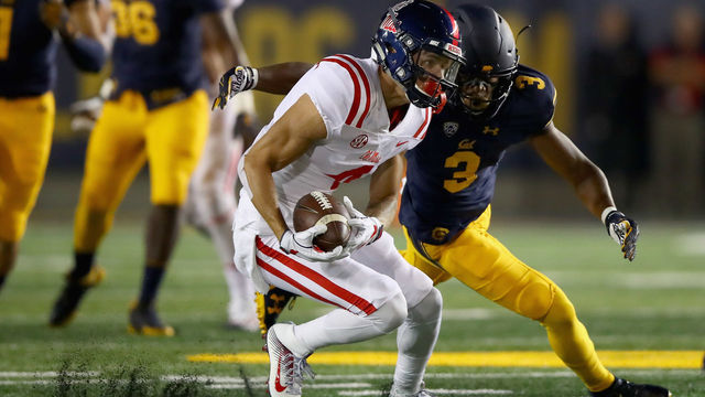 BERKELEY, CA - SEPTEMBER 16: Tre Nixon #4 of the Mississippi Rebels catches the ball while covered by Elijah Hicks #3 of the California Golden Bears at California Memorial Stadium on September 16, 2017 in Berkeley, California.
