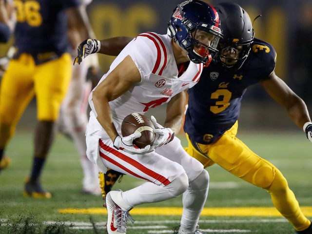 BERKELEY, CA - SEPTEMBER 16: Tre Nixon #4 of the Mississippi Rebels catches the ball while covered by Elijah Hicks #3 of the California Golden Bears at California Memorial Stadium on September 16, 2017 in Berkeley, California.