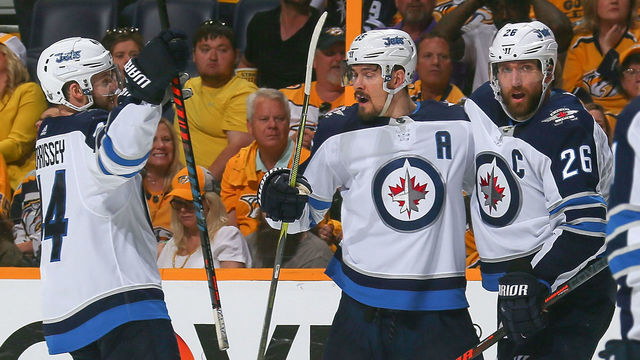 NASHVILLE, TN - MAY 10: Josh Morrissey #44, Mark Scheifele #55, Blake Wheeler #26, and Kyle Connor #81 celebrate a goal against the Nashville Predators during the second period in Game Seven of the Western Conference Second Round during the 2018 NHL Stanley Cup Playoffs at Bridgestone Arena on May 10, 2018 in Nashville, Tennessee.