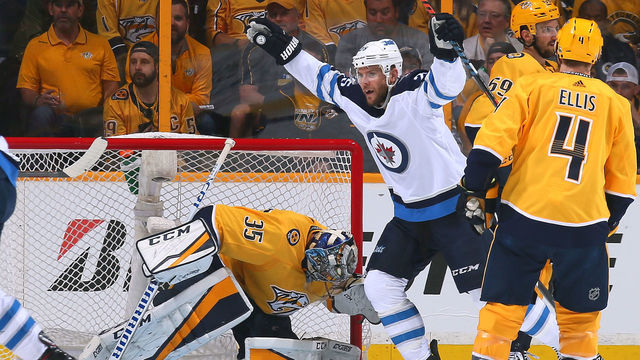 NASHVILLE, TN - MAY 10: Paul Stastny #25 of the Winnipeg Jets reacts after a Jets goal against goalie Pekka Rinne #35 of the Nashville Predators during the first period in Game Seven of the Western Conference Second Round during the 2018 NHL Stanley Cup Playoffs at Bridgestone Arena on May 10, 2018 in Nashville, Tennessee.