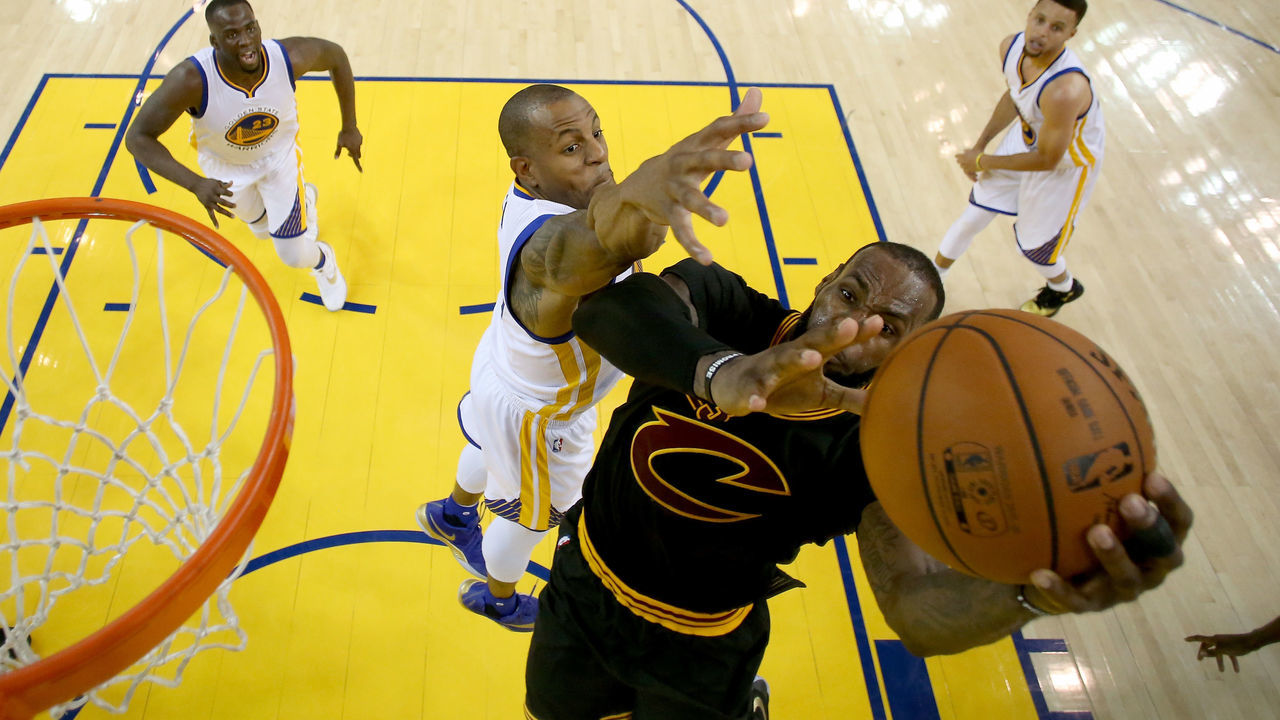 OAKLAND, CA - JUNE 19: Andre Iguodala #9 of the Golden State Warriors defends LeBron James #23 of the Cleveland Cavaliers in Game 7 of the 2016 NBA Finals at ORACLE Arena on June 19, 2016 in Oakland, California.