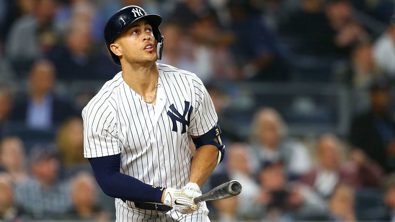 NEW YORK, NY - MAY 08: Giancarlo Stanton #27 of the New York Yankees connects on his second home run of the game in the bottom of the fourth inning against the Boston Red Sox at Yankee Stadium on May 8, 2018 in the Bronx borough of New York City.