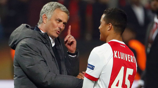 Manchester United's Portuguese manager Jose Mourinho (L) spaeks with Ajax Dutch forward Justin Kluivert after the UEFA Europa League final football match Ajax Amsterdam v Manchester United on May 24, 2017 at the Friends Arena in Solna outside Stockholm. / AFP PHOTO / Odd ANDERSEN