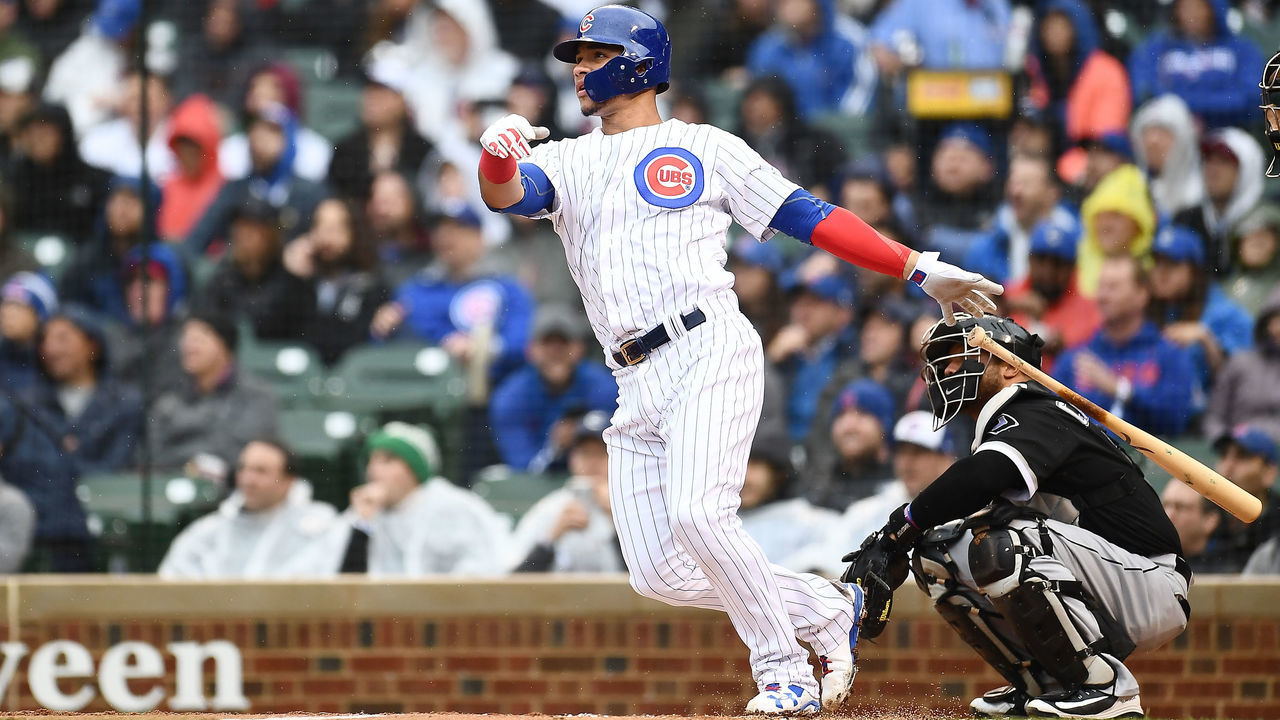 CHICAGO, IL - MAY 11: Willson Contreras #40 of the Chicago Cubs hits a grand slam against the Chicago White Sox during the first inning of a game at Wrigley Field on May 11, 2018 in Chicago, Illinois.