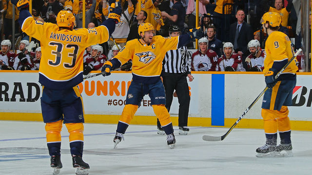 NASHVILLE, TN - APRIL 12: Viktor Arvidsson #33, Roman Josi #59, and Filip Forsberg #9 of the Nashville Predators celebrate after a goal against the Colorado Avalanche during the third period of a 5-2 Predators victory in Game One of the Western Conference First Round during the 2018 NHL Stanley Cup Playoffs at Bridgestone Arena on April 12, 2018 in Nashville, Tennessee.