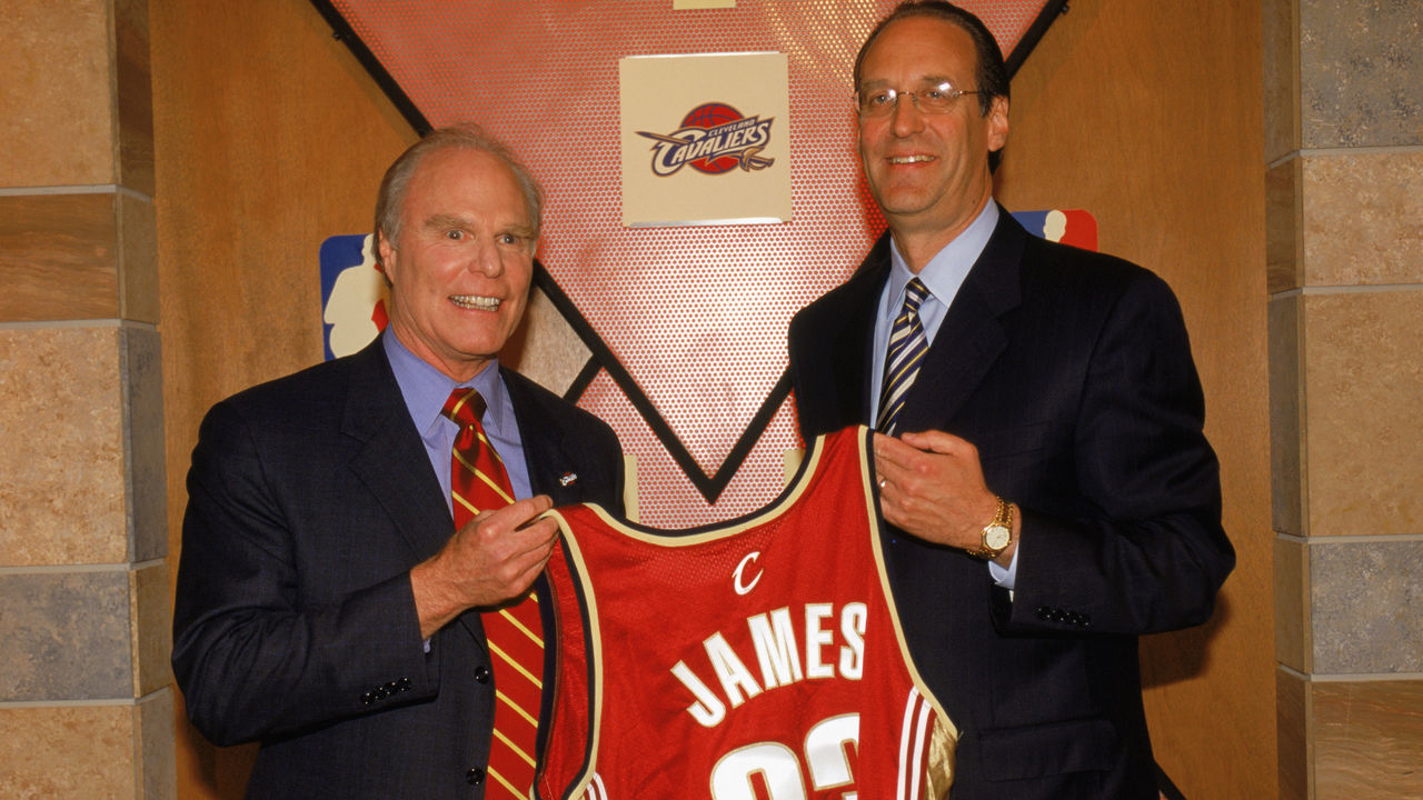SECAUCAS, NJ - MAY 22: Cavaliers owner Gordon Gund and deputy commissioner Russ Granik pose for a portrait as they hold up the #23 jersey to be worn by first draft pick LeBron James during the NBA Draft Lottery on May 22, 2003 in Secaucas, New Jersey. NOTE TO USER: User expressly acknowledges and agrees that, by downloading and/or using this Photograph, User is consenting to the terms and conditions of the Getty Images License Agreement. Mandatory copyright notice: Copyright 2003 NBAE (Photo by: Jennifer Pottheiser/NBAE via Getty Images)
