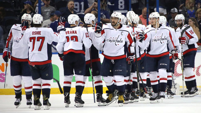 TAMPA, FL - MAY 11: Alex Ovechkin #8 of the Washington Capitals celebrates with his teammates after defeating the Tampa Bay Lightning in Game One of the Eastern Conference Finals during the 2018 NHL Stanley Cup Playoffs at Amalie Arena on May 11, 2018 in Tampa, Florida. The Washington Capitals defeated the Tampa Bay Lightning with a score of 4 to 2.