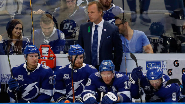 TAMPA, FL - MAY 11: Head Coach Jon Cooper of the Tampa Bay Lightning looks on against the Washington Capitals during the second period in Game One of the Eastern Conference Finals during the 2018 NHL Stanley Cup Playoffs at Amalie Arena on May 11, 2018 in Tampa, Florida.