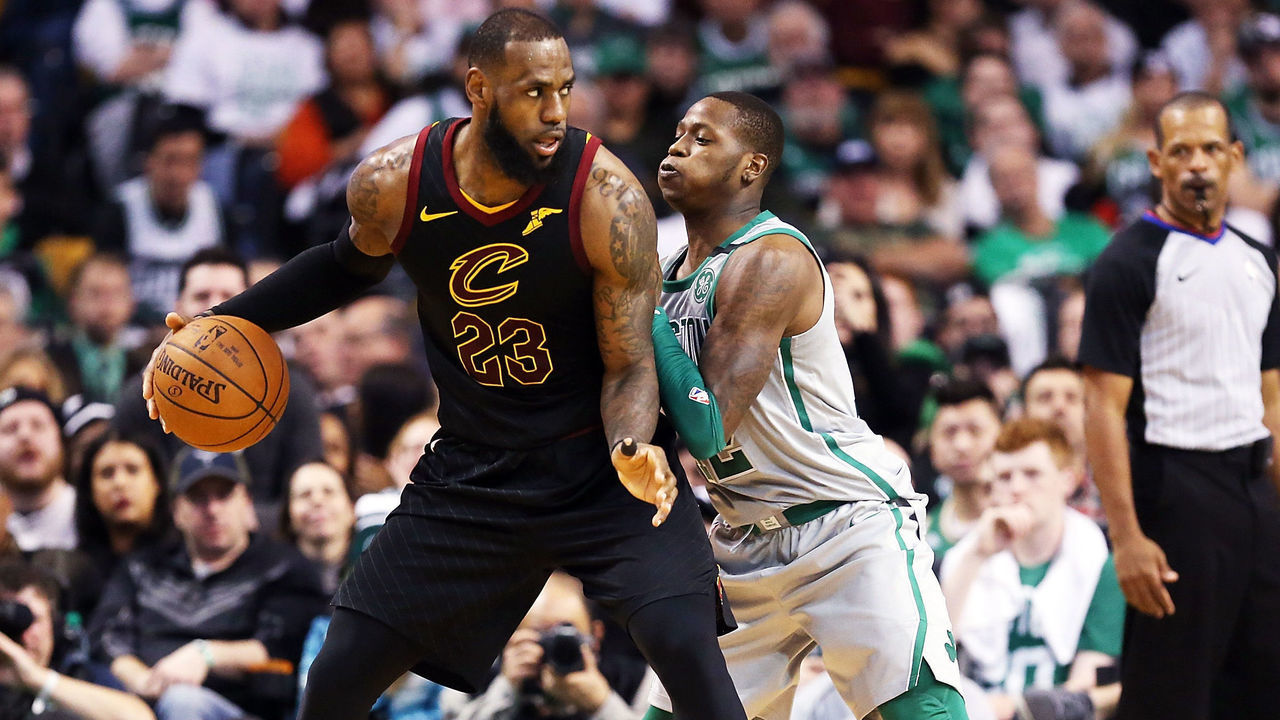 BOSTON, MA - FEBRUARY 11: Lebron James #23 of the Cleveland Cavaliers is guarded by Terry Rozier #12 of teh Boston Celtics in the second half during a game against the Boston Celtics at TD Garden on February 11, 2018 in Boston, Massachusetts.