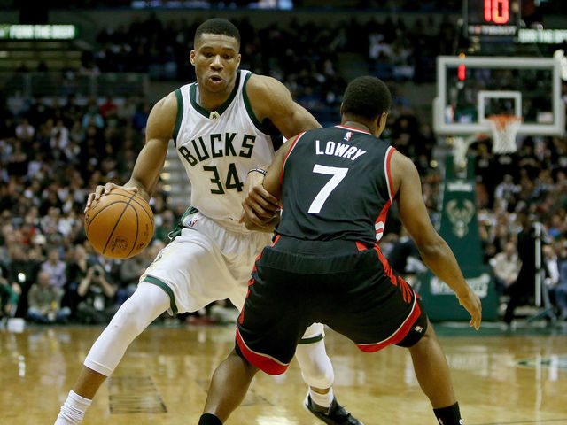 MILWAUKEE, WI - APRIL 27: Giannis Antetokounmpo #34 of the Milwaukee Bucks dribbles the ball while being guarded by Kyle Lowry #7 of the Toronto Raptors in the second quarter in Game Six of the Eastern Conference Quarterfinals during the 2017 NBA Playoffs at BMO Harris Bradley Center on April 27, 2017 in Milwaukee, Wisconsin.