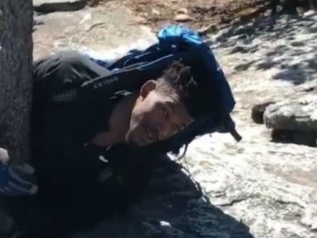 Watch: Jimmy Butler sings while hanging onto tree for dear life
