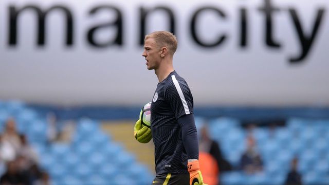 Manchester City's English goalkeeper Joe Hart warms up ahead of the English Premier League football match between Manchester City and Sunderland at the Etihad Stadium in Manchester, north west England, on August 13, 2016. Manchester City manager Pep Guardiola dropped goalkeeper Joe Hart in favour of Willy Caballero for his opening Premier League game against Sunderland on August 13. / AFP / OLI SCARFF /