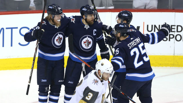WINNIPEG, MB - MAY 12: Patrik Laine #29 of the Winnipeg Jets celebrates his first period goal with his teammates against the Vegas Golden Knights in Game One of the Western Conference Finals during the 2018 NHL Stanley Cup Playoffs at Bell MTS Place on May 12, 2018 in Winnipeg, Canada.