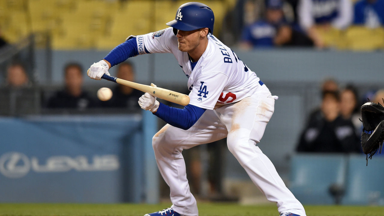 LOS ANGELES, CA - MAY 12: Los Angeles Dodgers First base Cody Bellinger (35) attempts to bunt during a Major League Baseball game between the Cincinnati Reds and the Los Angeles Dodgers on May 12, 2018 at Dodger Stadium in Los Angeles, CA.