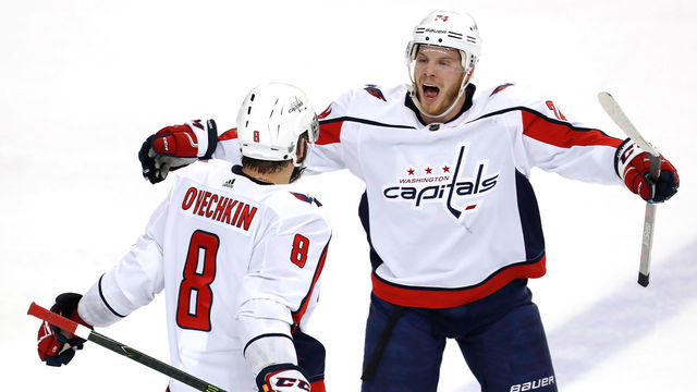 TAMPA, FL - MAY 11: Alex Ovechkin #8 of the Washington Capitals celebrates with teammate John Carlson #74 after scoring a goal against Andrei Vasilevskiy #88 of the Tampa Bay Lightning during the first period in Game One of the Eastern Conference Finals during the 2018 NHL Stanley Cup Playoffs at Amalie Arena on May 11, 2018 in Tampa, Florida.
