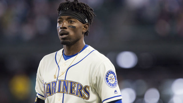 SEATTLE, WA - APRIL 15: Dee Gordon #9 of the Seattle Mariners reacts to being called out at first on a bunt, which was reviewed and upheld, during the ninth inning against the Oakland Athletics at Safeco Field on April 15, 2018 in Seattle, Washington. All players are wearing #42 in honor of Jackie Robinson Day.