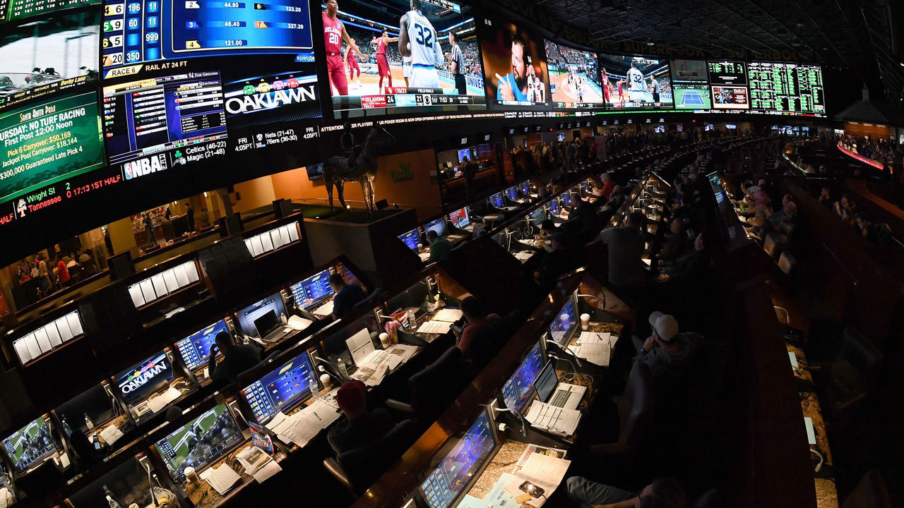 LAS VEGAS, NV - MARCH 15: Guests attend a viewing party for the NCAA Men's College Basketball Tournament inside the 25,000-square-foot Race & Sports SuperBook at the Westgate Las Vegas Resort & Casino which features 4,488-square-feet of HD video screens on March 15, 2018 in Las Vegas, Nevada.