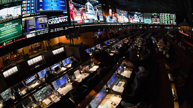 LAS VEGAS, NV - MARCH 15: Guests attend a viewing party for the NCAA Men's College Basketball Tournament inside the 25,000-square-foot Race & Sports SuperBook at the Westgate Las Vegas Resort & Casino which features 4,488-square-feet of HD video screens on March 15, 2018 in Las Vegas, Nevada.