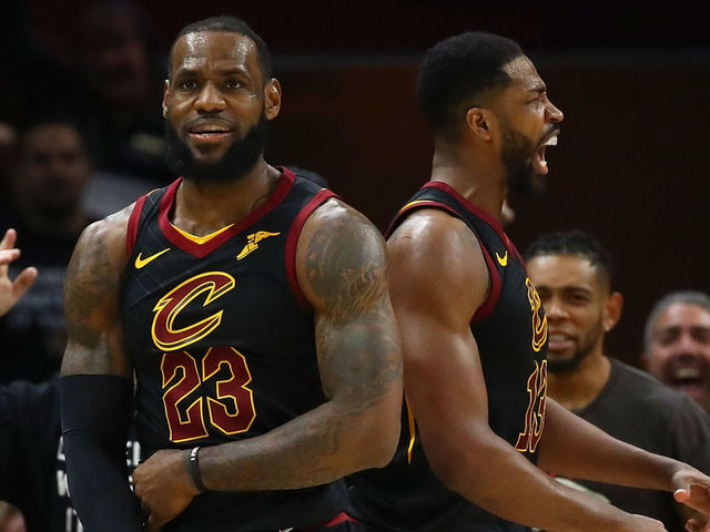 CLEVELAND, OH - APRIL 29: LeBron James #23 and Tristan Thompson #13 of the Cleveland Cavaliers react to a second half play while playing the Indiana Pacers in Game Seven of the Eastern Conference Quarterfinals during the 2018 NBA Playoffs at Quicken Loans Arena on April 29, 2018 in Cleveland, Ohio. Cleveland won the game 105-101 to win there series.