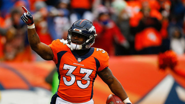 DENVER, CO - DECEMBER 31: Running back De'Angelo Henderson #33 of the Denver Broncos celebrates his first-quarter touchdown against the Kansas City Chiefs at Sports Authority Field at Mile High on December 31, 2017 in Denver, Colorado.
