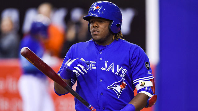 MONTREAL, QC - MARCH 27: Toronto Blue Jays infielder Vladimir Guerrero Jr. (27) gets ready for batting during the St. Louis Cardinals versus the Toronto Blue Jays spring training game on March 27, 2018, at Olympic Stadium in Montreal, QC
