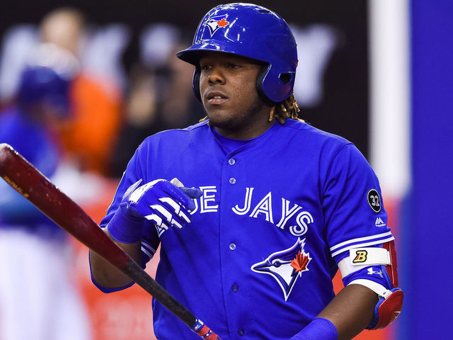 MONTREAL, QC - MARCH 27: Toronto Blue Jays infielder Vladimir Guerrero Jr. (27) gets ready for batting during the St. Louis Cardinals versus the Toronto Blue Jays spring training game on March 27, 2018, at Olympic Stadium in Montreal, QC