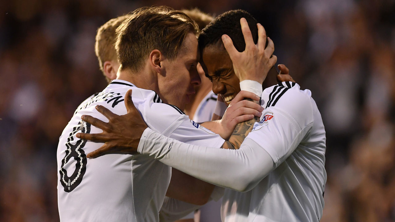 LONDON, ENGLAND - MAY 14: Ryan Sessegnon of Fulham celebrates with team mate Stefan Johansen after scoring his sides first goal during the Sky Bet Championship Play Off Semi Final, second leg match between Fulham and Derby County at Craven Cottage on May 14, 2018 in London, England.