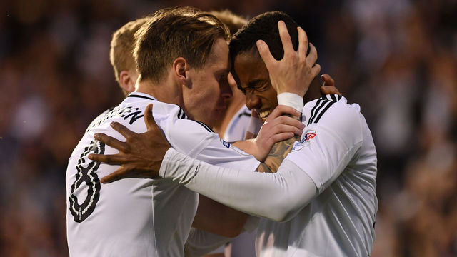 LONDON, ENGLAND - MAY 14: Ryan Sessegnon of Fulham celebrates with team mate Stefan Johansen after scoring his sides first goal during the Sky Bet Championship Play Off Semi Final, second leg match between Fulham and Derby County at Craven Cottage on May 14, 2018 in London, England.