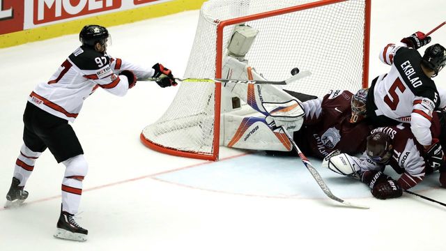 McDavid scores OT winner to prevent potential upset vs. Latvia