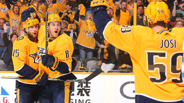 NASHVILLE, TN - APRIL 27: Roman Josi #59, Craig Smith #15, and Kyle Turris #8 celebrate after a goal against the Winnipeg Jets during the third period of a 4-1 Jets victory in Game One of the Western Conference Second Round during the 2018 NHL Stanley Cup Playoffs at Bridgestone Arena on April 27, 2018 in Nashville, Tennessee.