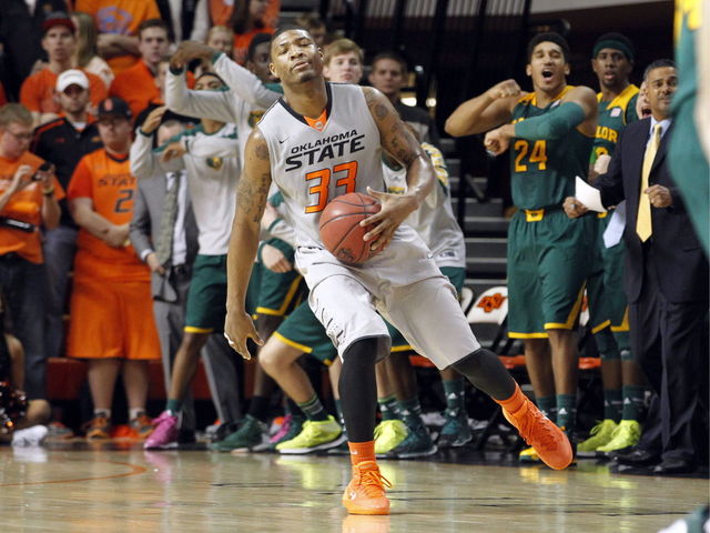 VIDEO: Marcus Smart considers flopping, instead slaps opponent in the face