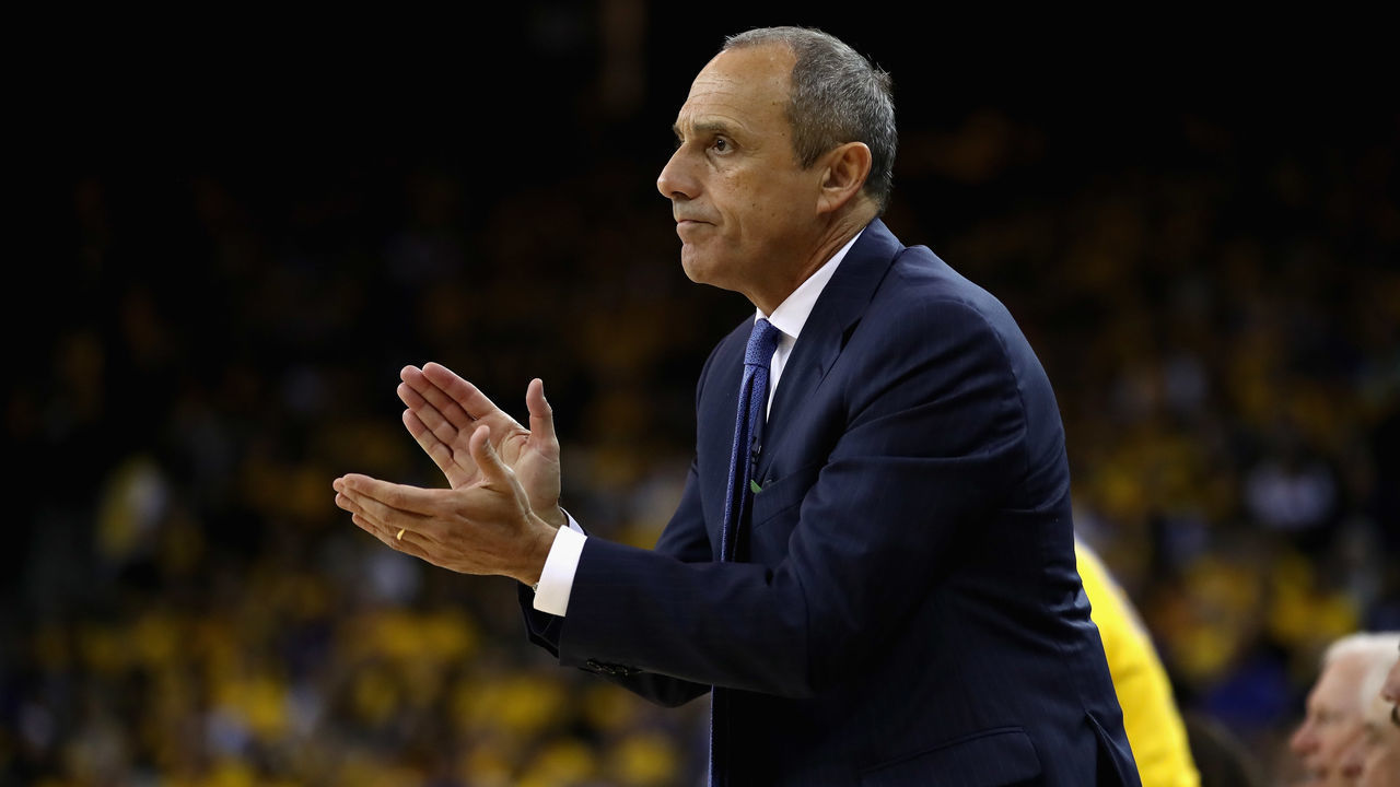 OAKLAND, CA - APRIL 24: San Antonio assistant coach Ettore Messina claps for his team during Game Five against the Golden State Warriors of Round One of the 2018 NBA Playoffs at ORACLE Arena on April 24, 2018 in Oakland, California.