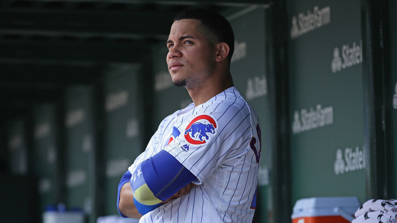 CHICAGO, IL - APRIL 10: Willson Contreras #40 of the Chicago Cubs waits in the dugout for play to begin before the Opening Day home game against the Pittsburgh Pirates at Wrigley Field on April 10, 2018 in Chicago, Illinois.
