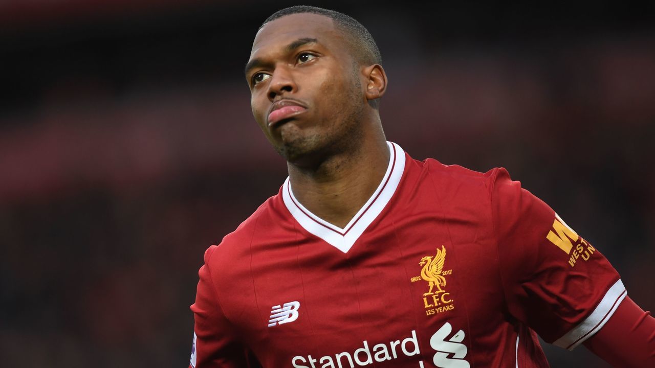 Liverpool's English striker Daniel Sturridge celebrates after scoring the opening goal of the English Premier League football match between Liverpool and Huddersfield Town at Anfield in Liverpool, north west England on October 28, 2017. / AFP PHOTO / Paul ELLIS /