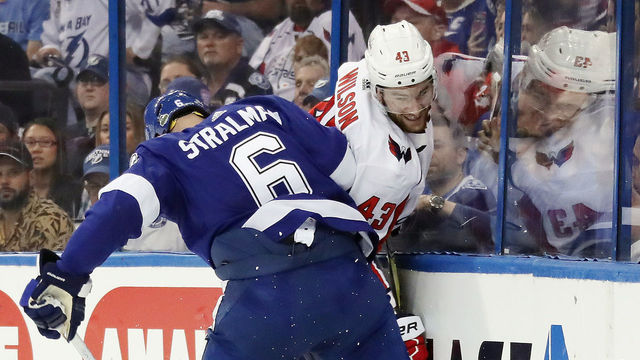 TAMPA, FL - MAY 11: Tom Wilson #43 of the Washington Capitals is checked by Anton Stralman #6 of the Tampa Bay Lightning in Game One of the Eastern Conference Finals during the 2018 NHL Stanley Cup Playoffs at the Amalie Arena on May 11, 2018 in Tampa, Florida. The Capitals defeated the Lightning 4-2.