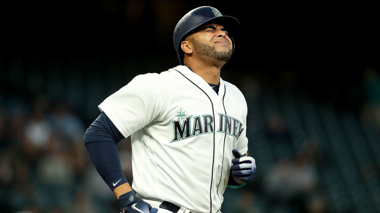 SEATTLE, WA - MAY 15: (EDITORS NOTE: Alternative crop) Nelson Cruz #23 of the Seattle Mariners reacts in the fourth inning after being hit by pitch in the foot by Brandon Mann #52 of the Texas Rangers which would cause him to leave the game during their game at Safeco Field on May 15, 2018 in Seattle, Washington.