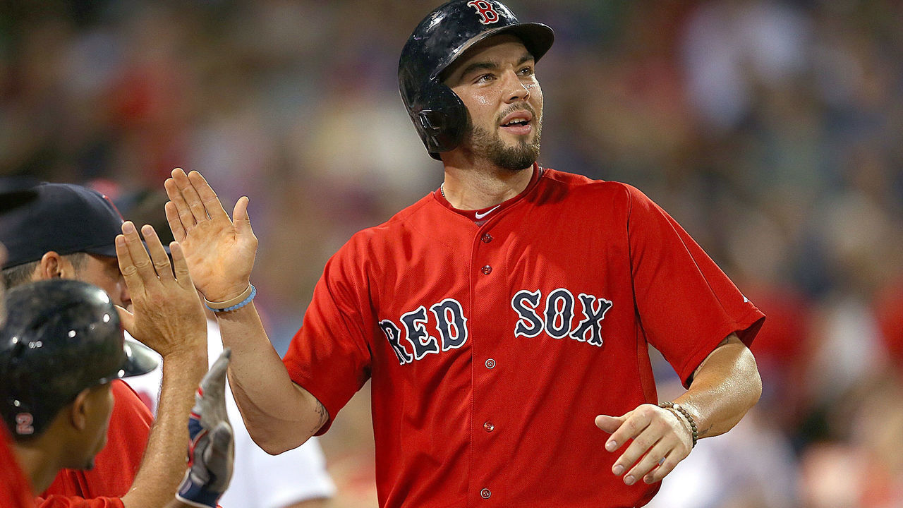 BOSTON, MA - AUGUST 21: Blake Swihart #23 of the Boston Red Sox reacts after he scored against the Kansas City Royals in the fourth inning on August 21, 2015 in Boston, Massachusetts.