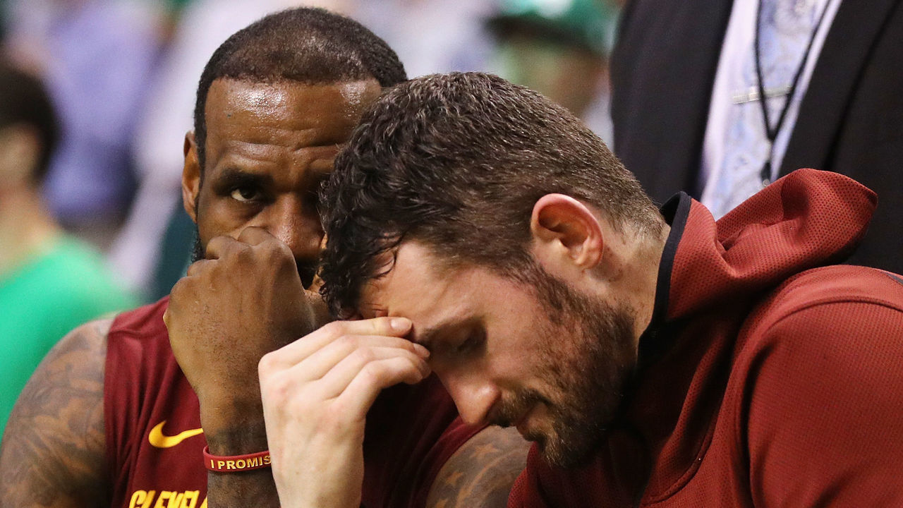 BOSTON, MA - MAY 15: LeBron James #23 and Kevin Love #0 of the Cleveland Cavaliers react on the bench in the second half against the Boston Celtics during Game Two of the 2018 NBA Eastern Conference Finals at TD Garden on May 15, 2018 in Boston, Massachusetts.