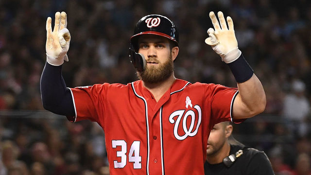 PHOENIX, AZ - MAY 13: Bryce Harper #34 of the Washington Nationals celebrates a solo home run in the third inning of the MLB game against the Arizona Diamondbacks at Chase Field on May 13, 2018 in Phoenix, Arizona.