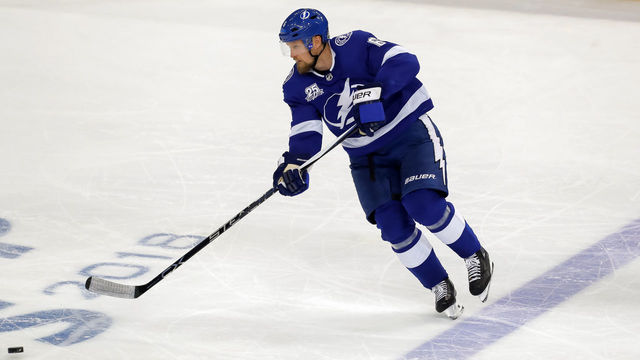 TAMPA, FL - MAY 13: Anton Stralman #6 of the Tampa Bay Lightning looks to move the puck against the Washington Capitals during the second period in Game Two of the Eastern Conference Finals during the 2018 NHL Stanley Cup Playoffs at Amalie Arena on May 13, 2018 in Tampa, Florida.
