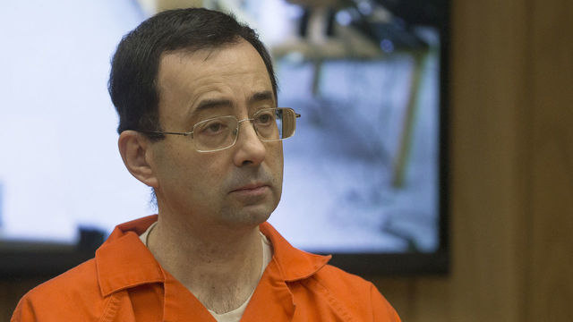 Former Michigan State University and USA Gymnastics doctor Larry Nassar appears in court for his final sentencing phase in Eaton County Circuit Court on February 5, 2018 in Charlotte, Michigan. / AFP PHOTO / RENA LAVERTY