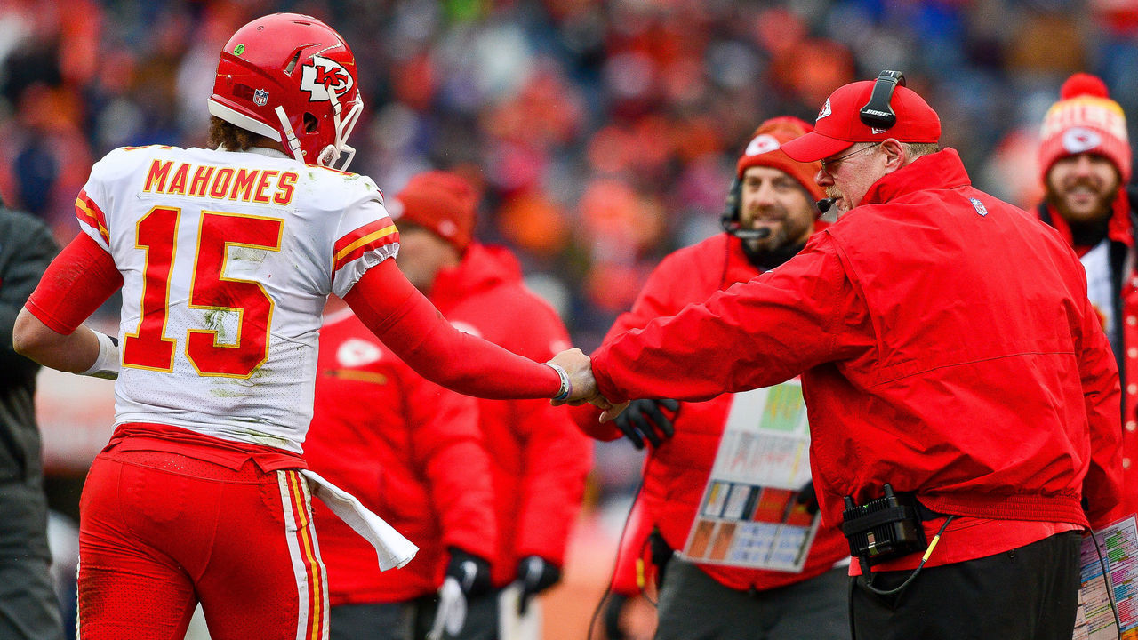 DENVER, CO - DECEMBER 31: Head coach Andy Reid of the Kansas City Chiefs celebrates with quarterback Patrick Mahomes #15 after the Kansas City Chiefs offense scored a touchdown against the Denver Broncosat Sports Authority Field at Mile High on December 31, 2017 in Denver, Colorado.