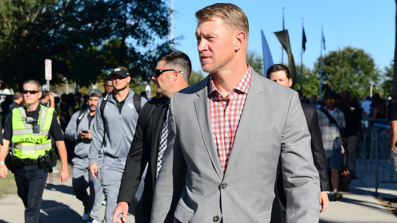 ORLANDO, FL - DECEMBER 2: Head coach Scott Frost of the UCF Knights walks up to the stadium with his team before pregame of the 2017 AAC Championship against the Memphis Tigers at Spectrum Stadium on December 2, 2017 in Orlando, Florida.